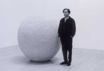 Anish Kapoor with his 1991 Turner Prize installation