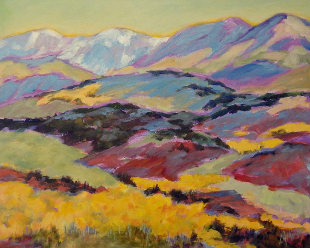 A painting of rolling hills and mountains in the autumn