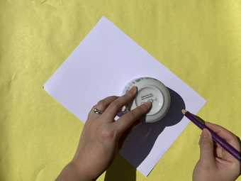 Image of a circle being drawn using a cup