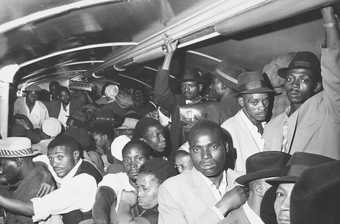 A Black-only commuter train carriage: ‘All stand packed together on the floors and seats.’