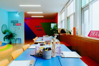 craft materials are laid out in a workshop space