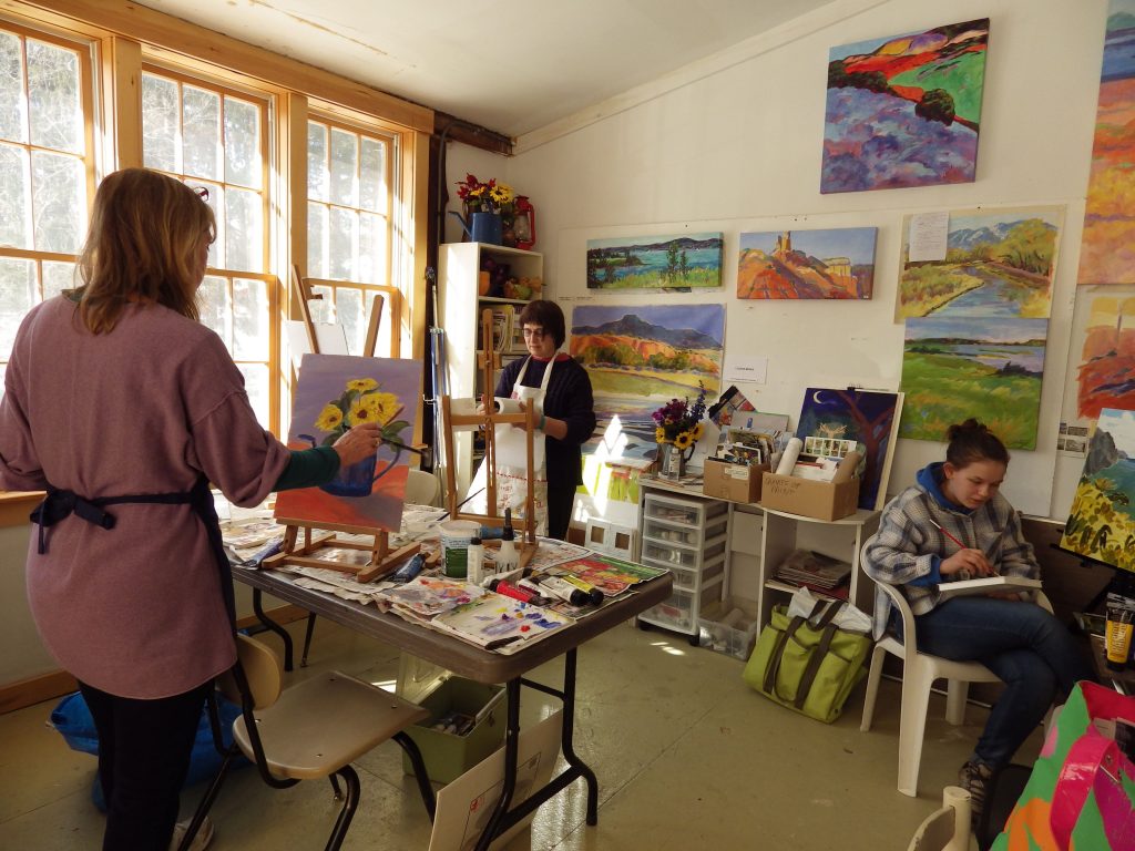 Students learning in Louise Minks' studio