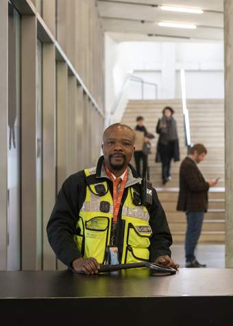 A person wearing a high visibility jacket